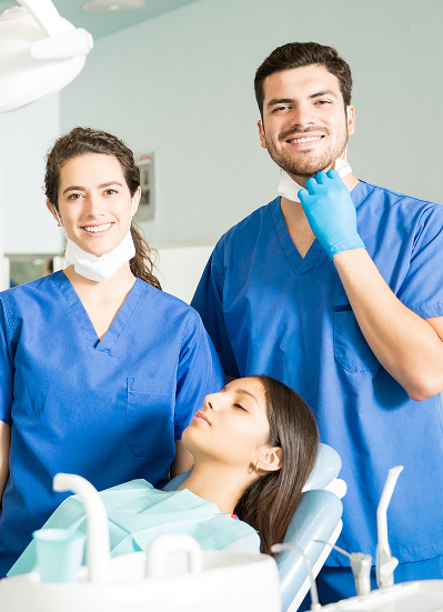 a young couple of dentists at work