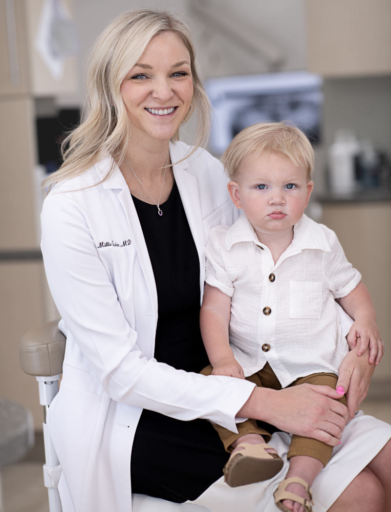 Dr. McKenzie Tucker, MD with son