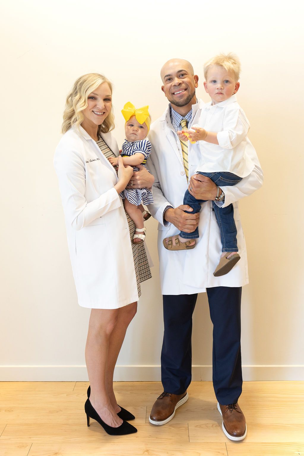 Sunrise Dental Cary team portrait with dentist, hygienist, and two children